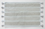 Cozy striped bathroom mat underfoot