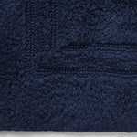 Classic bordered blue bath mat