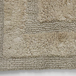 Absorbent cotton bath mat in neutral beige