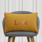 Love embroidered mustard cushion