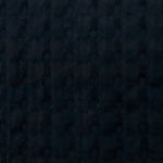 Black cushion with soft fringe border detailing