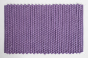 Plush lavender bath mat close-up