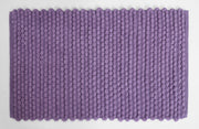 Bubble textured bathroom mat underfoot