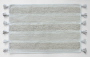Cozy striped bathroom mat underfoot