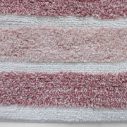 Plush microfiber bath mat with tassels