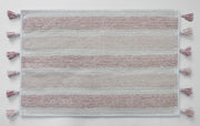 Soft blush striped bath mat underfoot