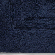 Classic bordered blue bath mat