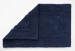 Deep blue cushioned bath mat