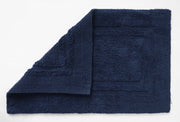 Deep blue cushioned bath mat
