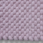 Pastel pink plush bathroom mat