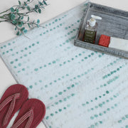 Aqua dotted plush bath mat