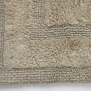 Absorbent cotton bath mat in neutral beige