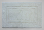 Ultra-soft white bath mat texture