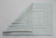 Minimal white bath mat with border