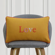 Love embroidered mustard cushion