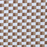 Brown white cushion with textured pattern