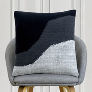Black and grey abstract woven cushion