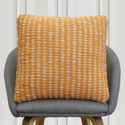 Mustard and white textured checkered cushion